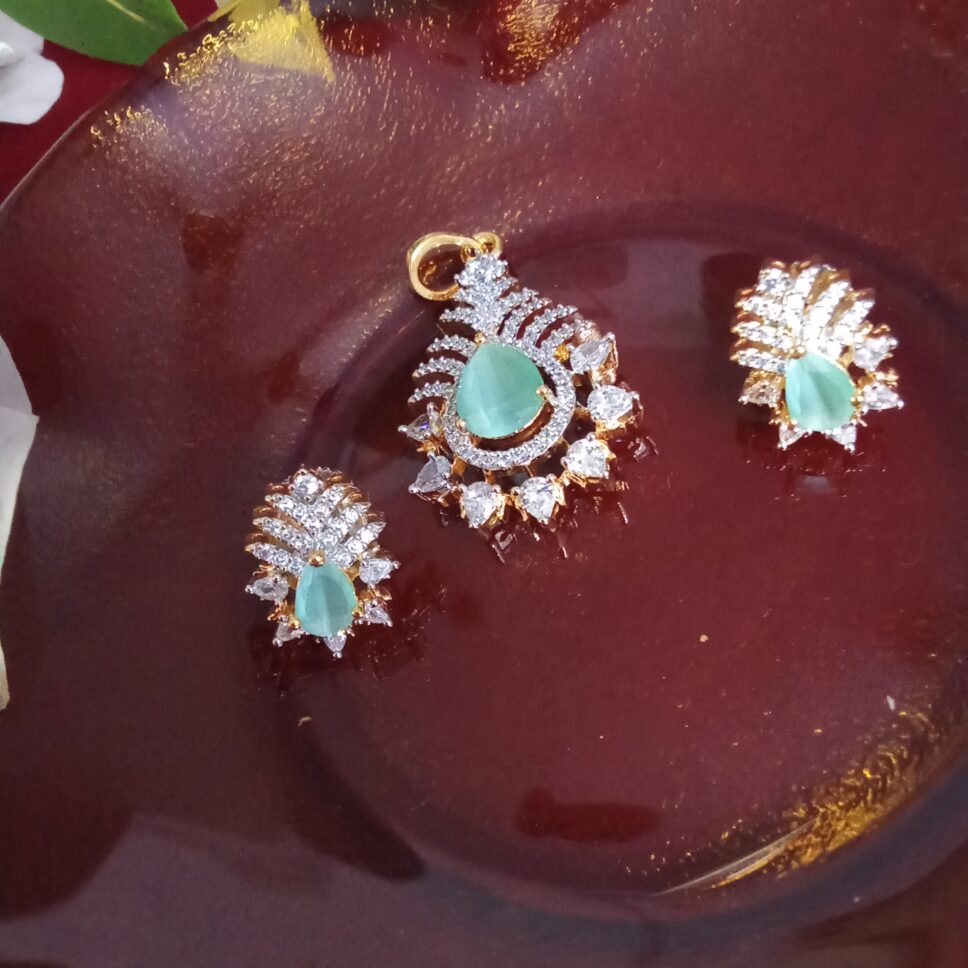Teal Color White Zercon Studded Locket Set