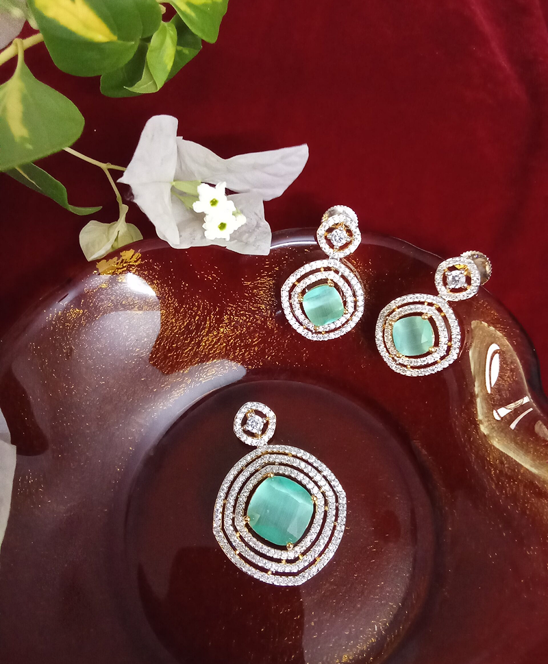 Teal Color Cats Eye Stone with White Zercon Studded Locket Set  -